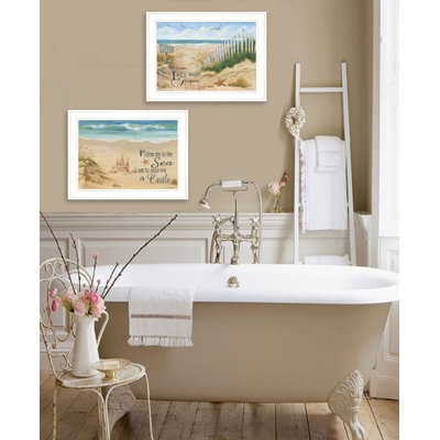 Ensemble de deux châteaux de sable et empreintes de pas, art mural