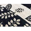 Tapis noir et ivoire de haute qualité noué à la main