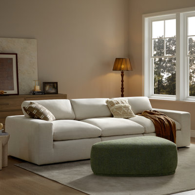 Adna 44'' Triangular Upholstered Ottoman