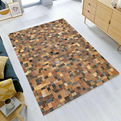 Tapis patchwork en cuir tissé à la main en brun, noir et beige
