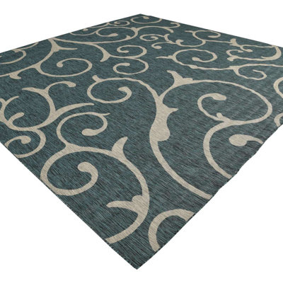 Teal Floral Machine Woven Polypropylene Indoor / Outdoor Area Rug in Teal