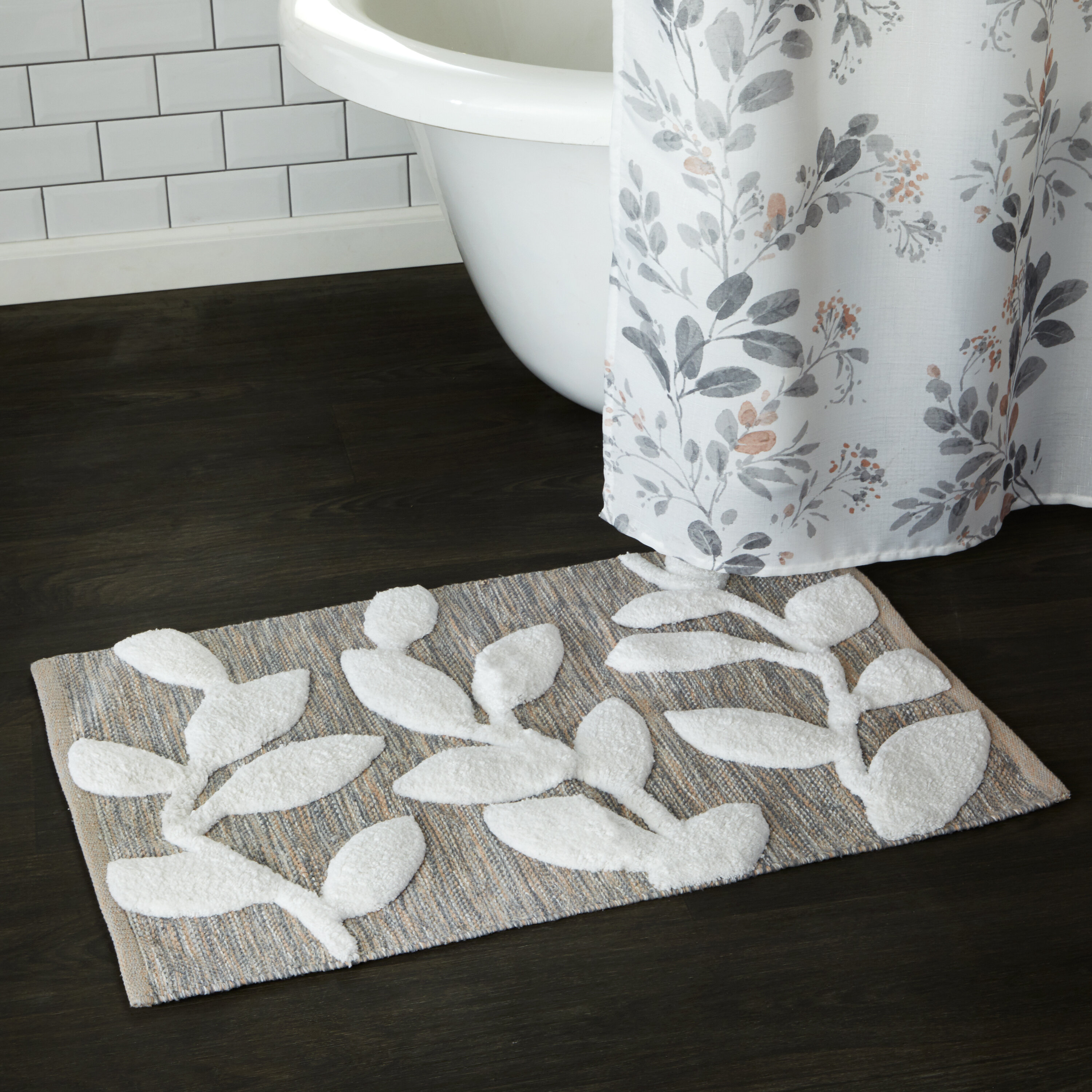 https://assets.wfcdn.com/im/05549559/compr-r85/1266/126695664/adeleen-cotton-blend-bath-rug-with-non-slip-backing.jpg