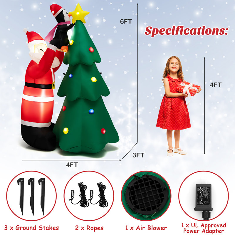 Arbre de Noël et père Noël gonflable