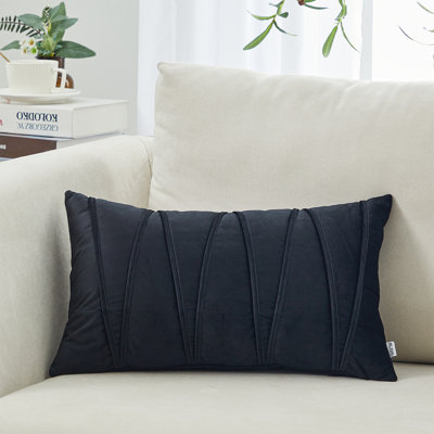 Coussin en velours à chevrons