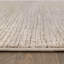 Tapis rayé beige texturé à rayures-710642