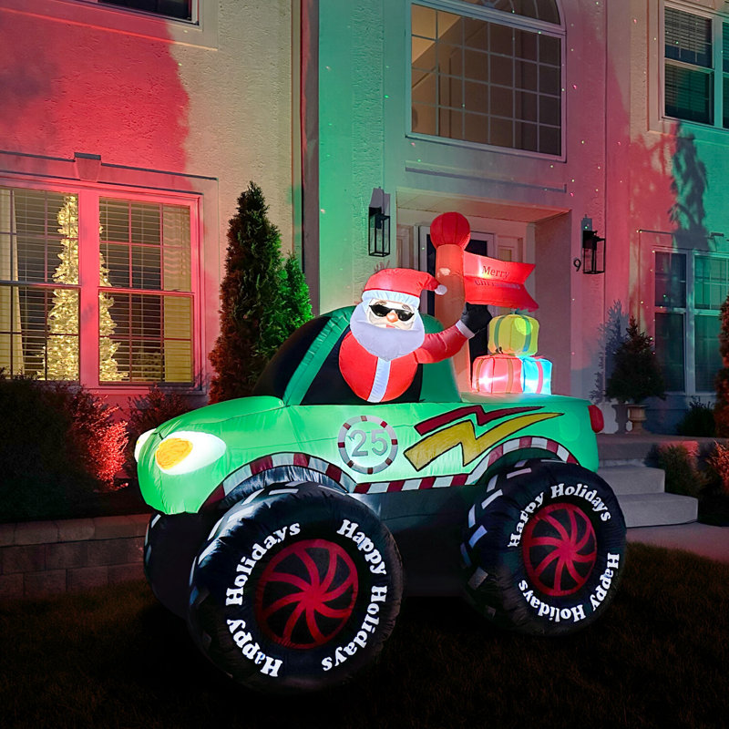 6-Ft Tall Pre-lit Santa in Green Monster Truck Inflatable