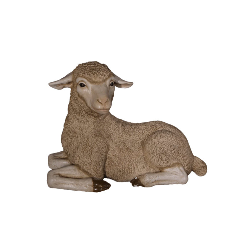 Statue de bébé agneau mérinos au repos