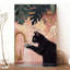 Chat noir douillet qui se lave les mains - Urban Studio-1377134603