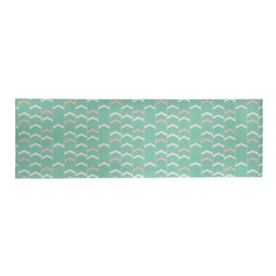 Tapis rouge pâle/rose à chevrons