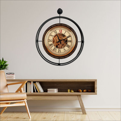 Horloge murale élégante en métal, noire, 22,8 po x 25,6 po x 2,8 po | Fabrication 100% métal, poids léger de 5,5 lb | Parfait pour le salon, le bureau et la maison, design élégant et fonctionnel