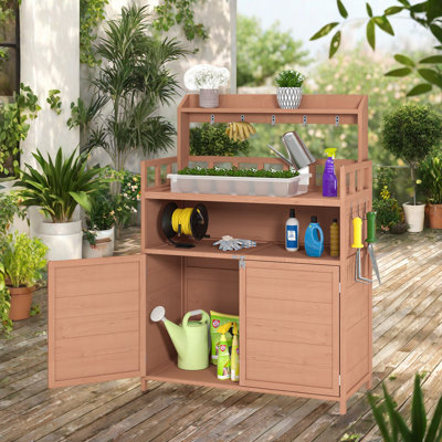 Banc de rempotage pour l'extérieur avec jardin et poste de travail en bois