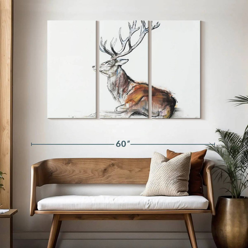 Cerf assis, H 32 po x l 50 po