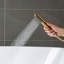 Robinet de baignoire autoportant monocommande à fixation au sol avec douche à main-64114624