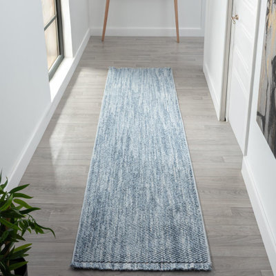 Tapis texturé à franges