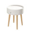 Table de chevet avec tiroir de rangement et pieds en chêne pour un usage domestique