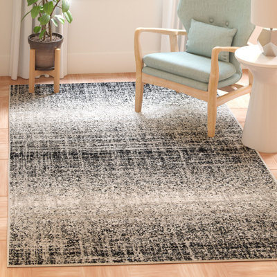 Riebe Abstract Silver/Black Area Rug