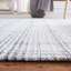 Tapis performance tissé à la main Earica-1152348828