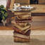 Table en verre avec base représentant des livres empilés Montegue