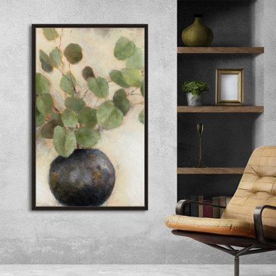 «Eucalyptus Leaves in Black Vase» par Lanie Loreth - peinture sur toile à cadre flottant