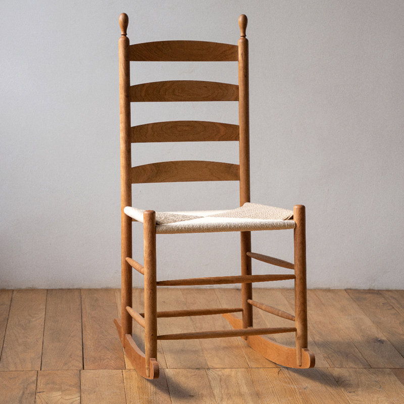 Chaise berçante en cerisier tissé