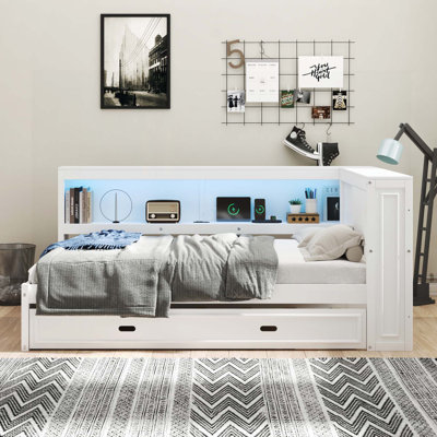 Functional Wood Daybed with Storage Shelves, USB Ports, LED Lighting, and Trundle for Enhanced Comfort and Space Utilization
