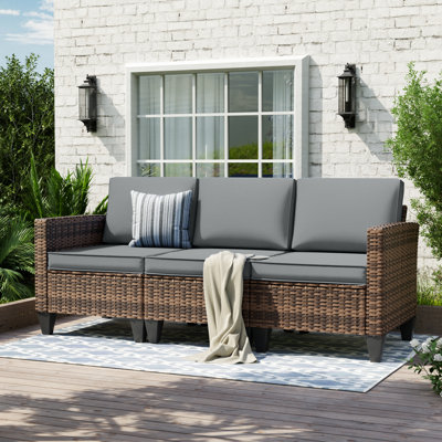 Kisner 78" W 3 - Person Outdoor Wicker Patio Sofa With Cushions