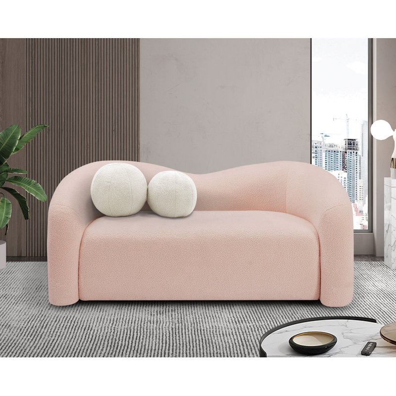 Causeuse rembourrée Kali, Tissu rose en fausse peau de mouton