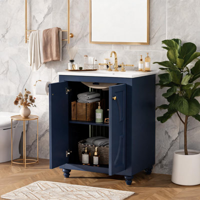 Meuble-lavabo moderne de 24 po de style moderne avec motif elliptique, charnières à fermeture en douceur, structure à dossier ouvert et pieds tournés en boule