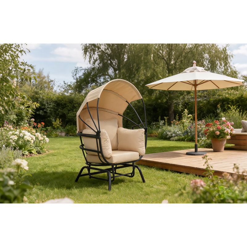 Fauteuil d'extérieur avec coussins et auvent rétractable