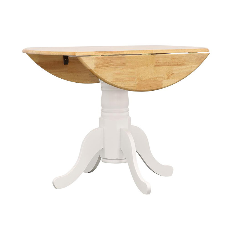 Versatile Drop Leaf Table With Stylish Pedestal Base And Ornamental Legs For Intimate Dining And Space Adaptability.