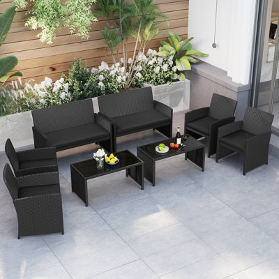 Ensemble de conversation pour patio avec coussins de siège et porche de table en verre trempé noir