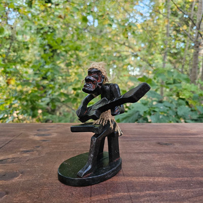  Hand Carved Tribal Tiki Figurine Playing Guitar – Primitive One Leg Raised Statue, Wooden Musician, Island Decor, Handmade Wood Sculpture