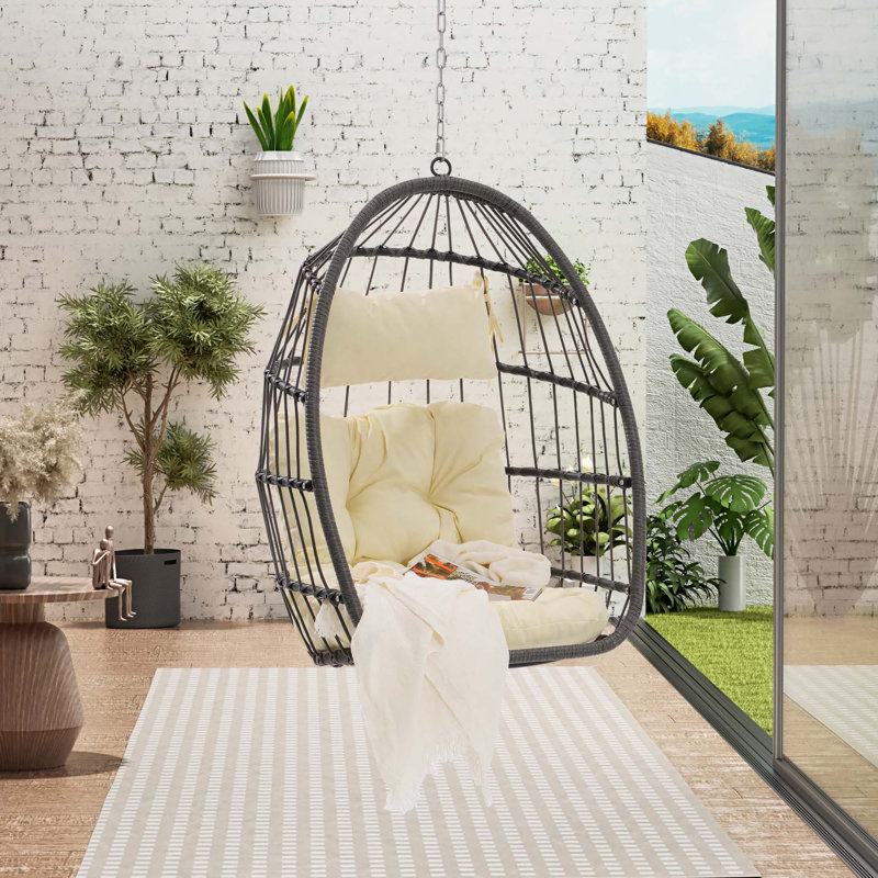 Chaise longue d'extérieur suspendue en rotin Eleise, Beige