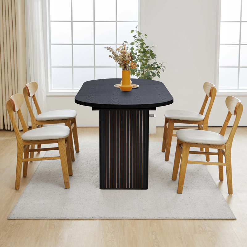 Dilakshan Oval 70.86'' L x 31.49'' W Dining Table, Black