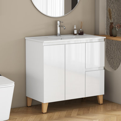 Ensemble de meuble-lavabo moderne 36 po avec lavabo combiné, 2 portes et 2 grands tiroirs, système de fermeture en douceur, conception sans poignée, pieds en bois massif naturel, lavabo en céramique, lavabo en céramique, assemblage facile
