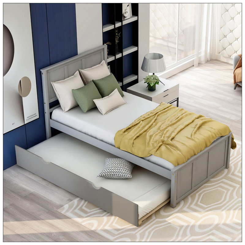 Lit plateforme simple avec lit gigogne en bois robuste peu encombrant, idéal pour les chambres compactes et les chambres d'amis.