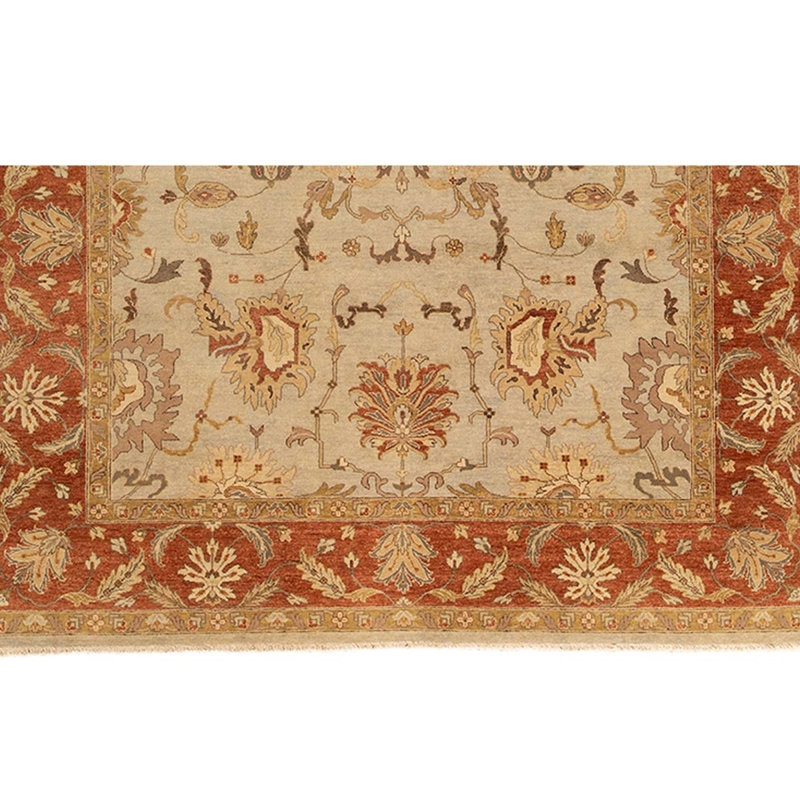 Tapis orange / ivoire noué à la main