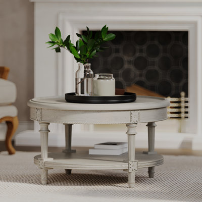 Table basse ronde traditionnelle en bois Maven Lane Pullman au fini blanc antique