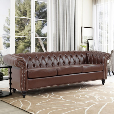 Aniaya 84'' Wide Faux Leather Sofa Button Tufted Chesterfield Couch with Arms Modern Sofa Couch -  Charlton HomeÂ®, CEAAF27BAC654910ACDC59885A4A76AE