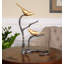 Sculpture oiseaux sur un membre