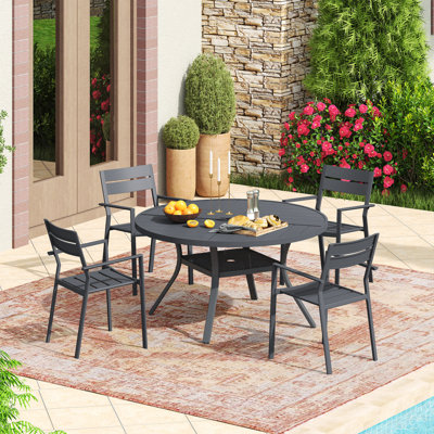 Ensemble repas pour 4 personnes avec table de salle à manger et 4 chaises empilables en métal
