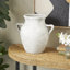 Vase texturé en céramique avec ombrages et poignées-454422366