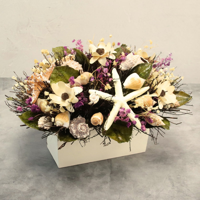 Arrangement floral de coquillage mélangé