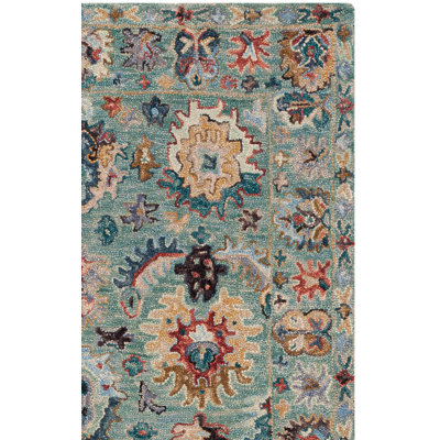 Shuo Tufted Wool/Cotton Performance Floral Rug in Blue/Rust