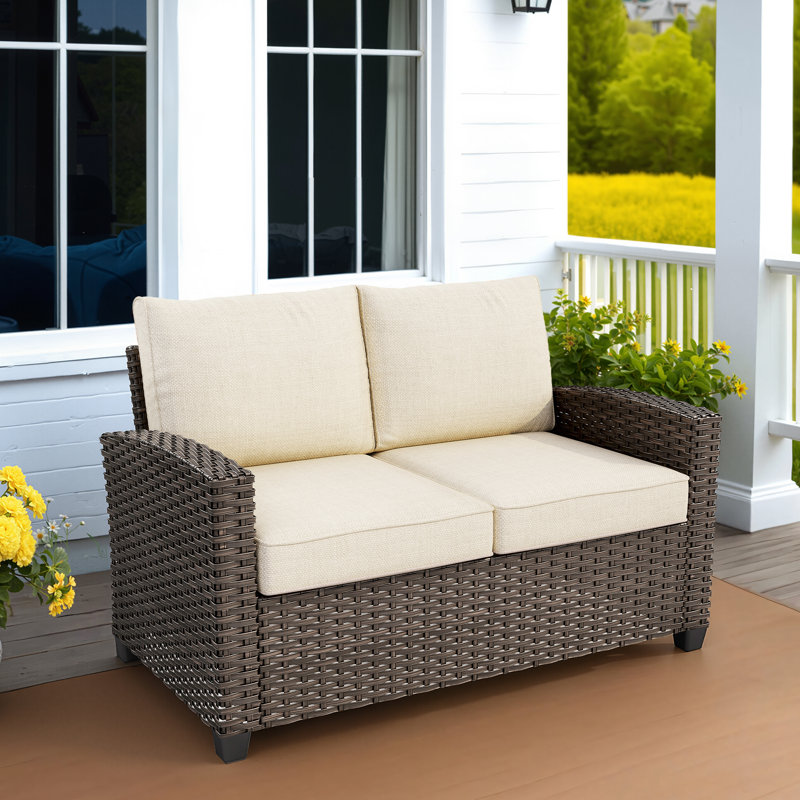 Canapé d'extérieur en osier avec coussins Eaker, Beige