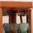 Corner Lighted Curio Cabinet With Adjustable Glass Shelves And Mirrored Back, Ideal For Displaying Antiques, Wine, And More In Living Rooms