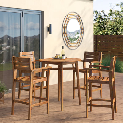 Carlleen 4 - Person Wood Patio Dining Set with Oval Table