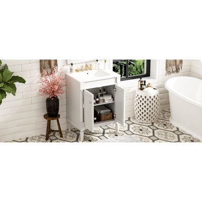 Meuble-lavabo 24 po avec lavabo en céramique. Moderne. Bois massif. Lavabo brillant. Blanc. Vaste espace de rangement. Charnières. Compatible avec un robinet de 4 po. Évier supérieur moderne à poignée exquise. Cadre. Planches.