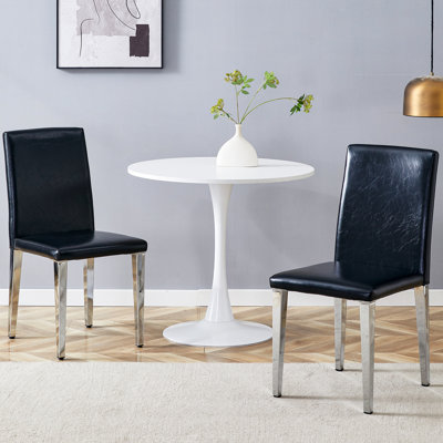 Chaises de salle à manger en polyuréthane noir, pattes en métal argenté, de 2, solution de siège à la mode et pratique, éponge de haute qualité, apparence de conception simple et élégante, taille ajustée, assemblage facile