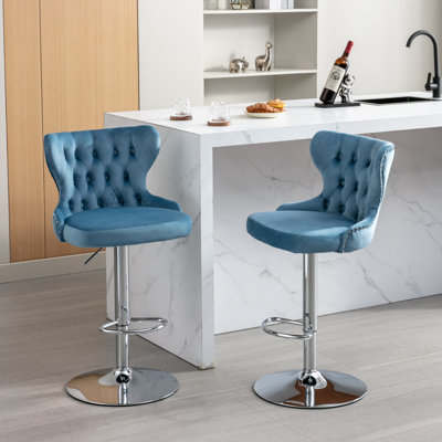 Hinderikus Swivel Upholstered Adjustable Height Counter Stool